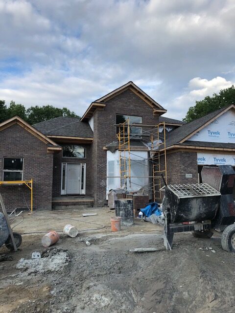 Brick facade installation in progress in Farmington, Michigan