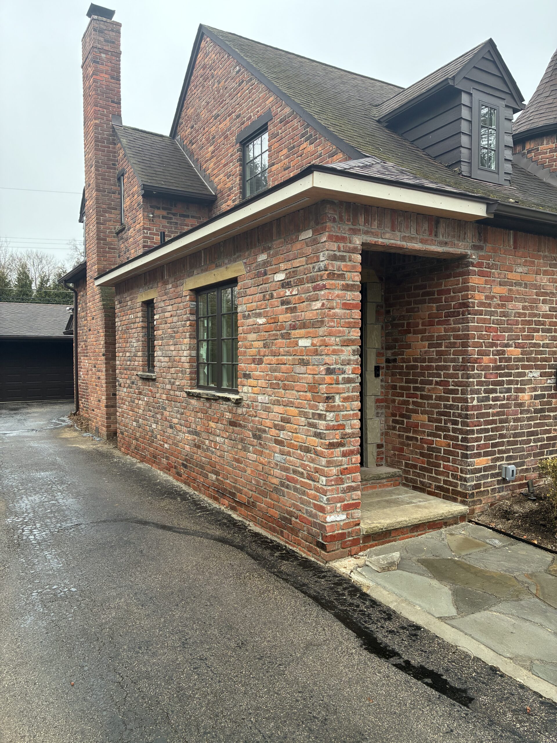 Brick facade with limestone sill detailing