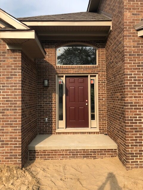 Brick facade on new home in Farmington, Michigan